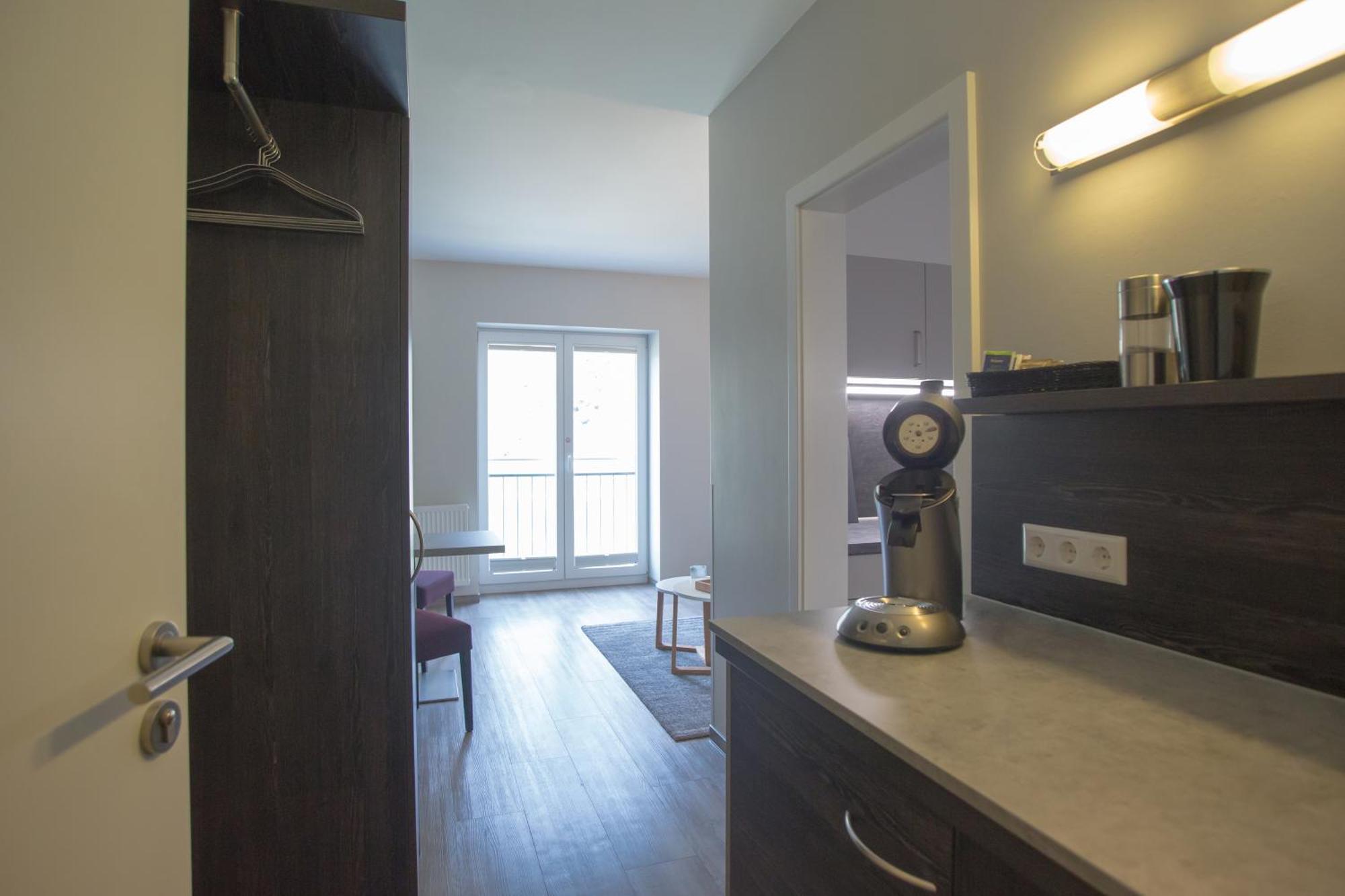 Aparthotel كوتشيم الغرفة الصورة